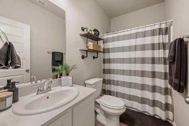 3018 Dakota Trl, Crandall, TX 75114 - full bathroom featuring vanity, a textured wall, and a shower with shower curtain
