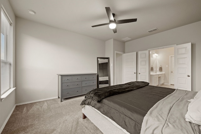 3018 Dakota Trl, Crandall, TX 75114 - carpeted bedroom featuring ensuite bath and a ceiling fan