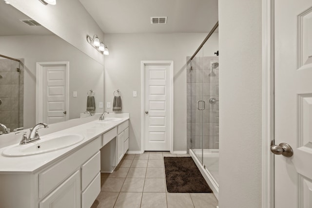3018 Dakota Trl, Crandall, TX 75114 - full bath with double vanity, tile patterned floors, and a stall shower