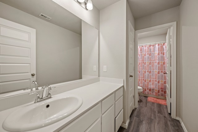 3018 Dakota Trl, Crandall, TX 75114 - full bathroom with wood finished floors and vanity