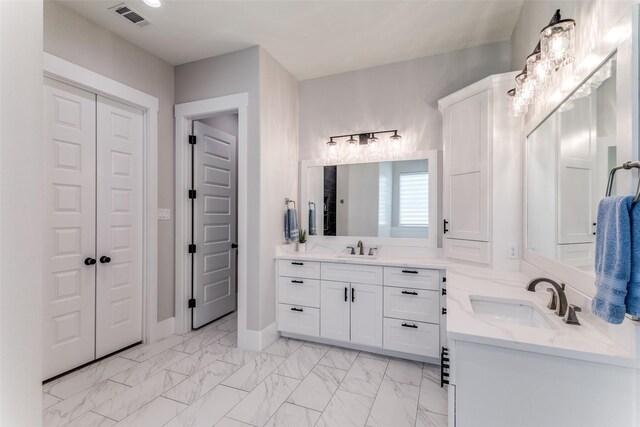 1757 Country Club Rd, Bowie, TX 76230 - full bath featuring two vanities and marble finish flooring