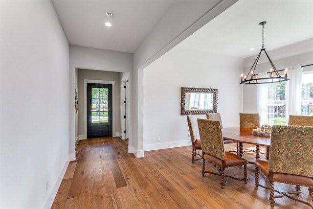 1757 Country Club Rd, Bowie, TX 76230 - dining area featuring a chandelier, light wood-type flooring, and recessed lighting