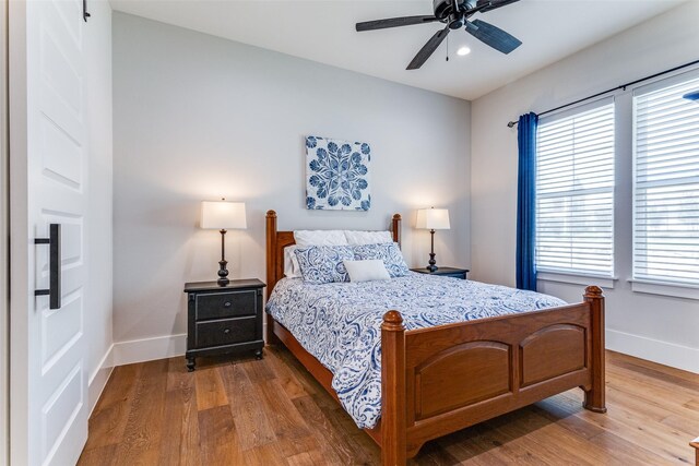 1757 Country Club Rd, Bowie, TX 76230 - bedroom featuring wood finished floors, recessed lighting, and a ceiling fan