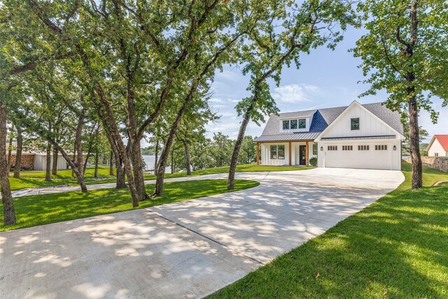1757 Country Club Rd, Bowie, TX 76230 - modern inspired farmhouse featuring driveway, a front yard, a garage, and a porch