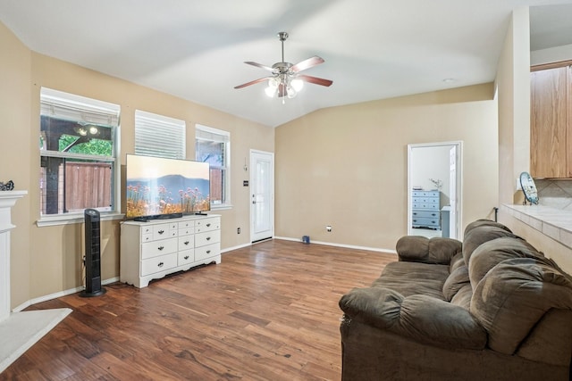 1323 Canyon Creek Rd, Wylie, TX 75098 - living room featuring a ceiling fan, wood finished floors, and a fireplace