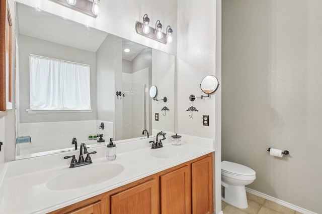 1323 Canyon Creek Rd, Wylie, TX 75098 - bathroom with double vanity, a shower, and tile patterned flooring