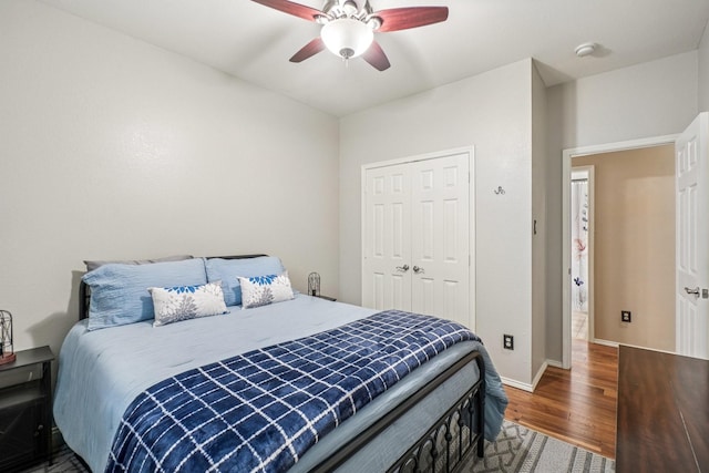 1323 Canyon Creek Rd, Wylie, TX 75098 - bedroom with wood finished floors, a ceiling fan, and a closet