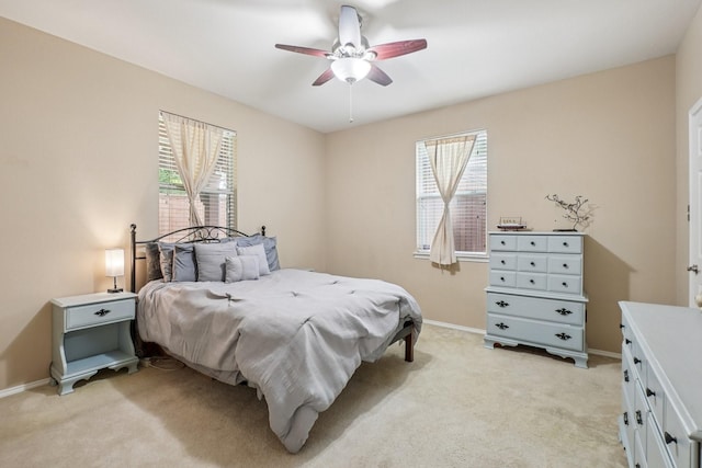 1323 Canyon Creek Rd, Wylie, TX 75098 - bedroom with light colored carpet and ceiling fan