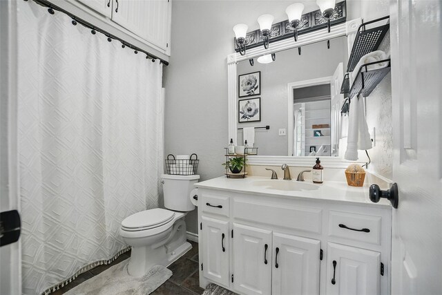 7104 Harlan Dr, Rockwall, TX 75087 - bathroom with vanity, stone finish flooring, and a shower with shower curtain