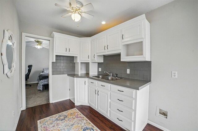 7104 Harlan Dr, Rockwall, TX 75087 - kitchen featuring a ceiling fan, dark wood-type flooring, decorative backsplash, white cabinetry, and dark countertops