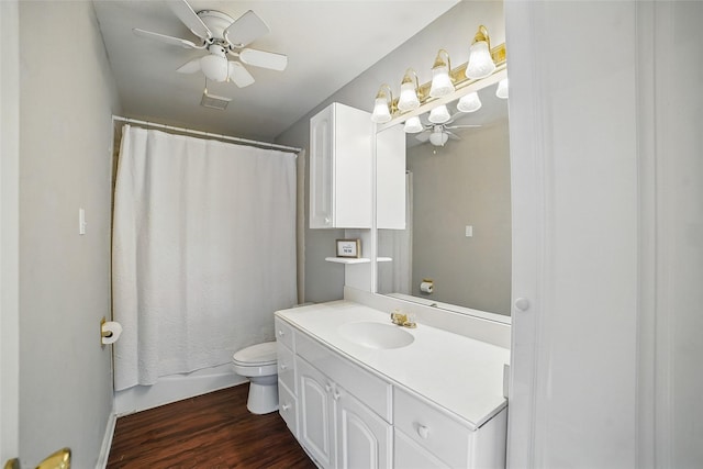 7104 Harlan Dr, Rockwall, TX 75087 - full bath with vanity, wood finished floors, and a ceiling fan
