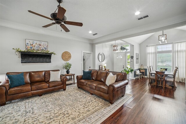 7104 Harlan Dr, Rockwall, TX 75087 - living area featuring wood finished floors, a ceiling fan, recessed lighting, ornamental molding, and lofted ceiling