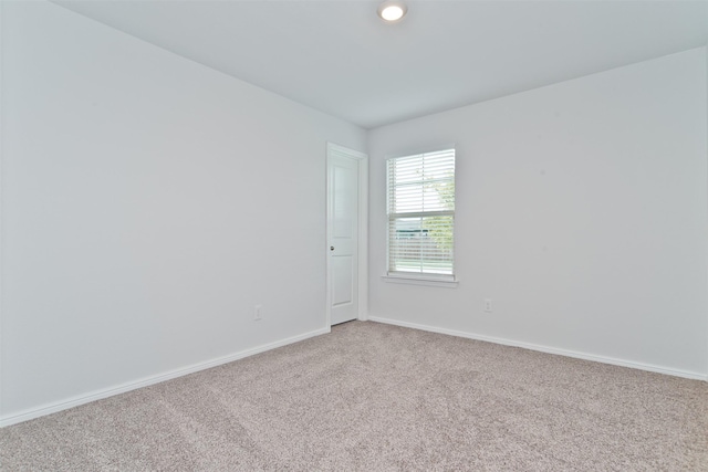 941 Loomis Trl, Justin, TX 76247 - unfurnished room with light carpet and baseboards