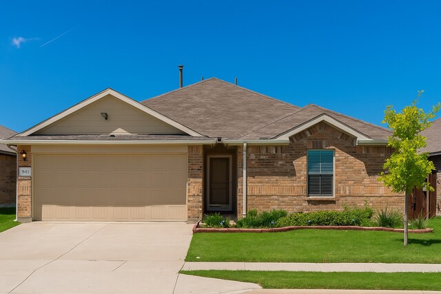 941 Loomis Trl, Justin, TX 76247 - ranch-style house featuring concrete driveway, a garage, brick siding, and a front lawn