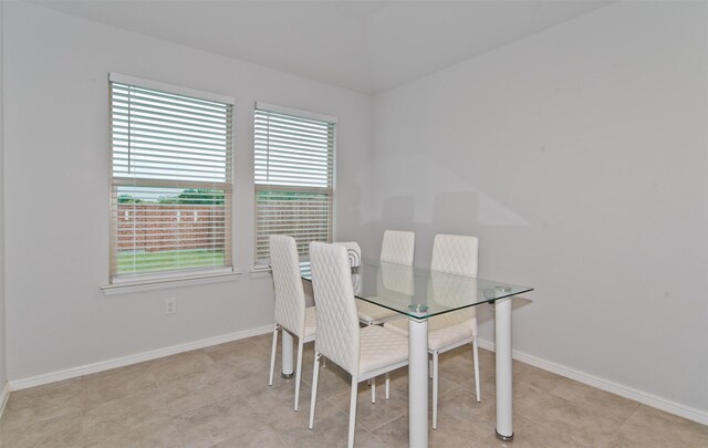 941 Loomis Trl, Justin, TX 76247 - dining area with baseboards and vaulted ceiling