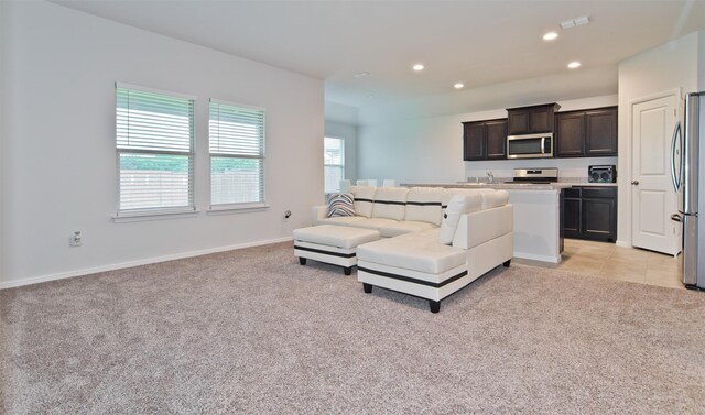 941 Loomis Trl, Justin, TX 76247 - living area featuring light colored carpet and recessed lighting