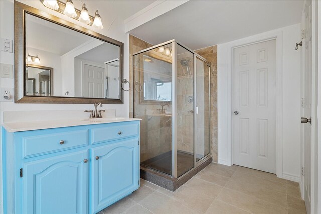 4821 Monte Vista Ln, Mckinney, TX 75070 - bathroom featuring vanity, tile patterned flooring, and a stall shower