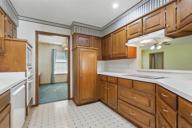 4018 Oakview Cir, Alvarado, TX 76009 - kitchen with dishwashing machine, electric cooktop, under cabinet range hood, a ceiling fan, and light flooring