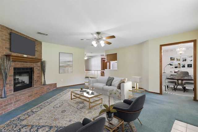4018 Oakview Cir, Alvarado, TX 76009 - carpeted living room featuring a fireplace and a ceiling fan