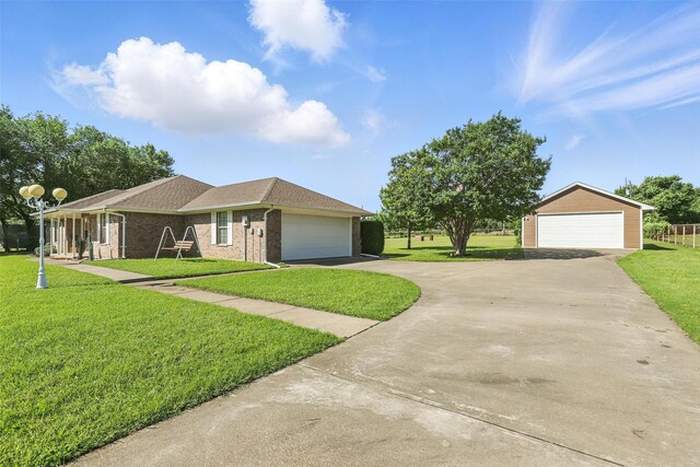 4018 Oakview Cir, Alvarado, TX 76009 - single story home featuring a front lawn, brick siding, a garage, and an outbuilding