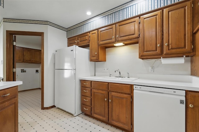 4018 Oakview Cir, Alvarado, TX 76009 - kitchen featuring white appliances, light countertops, brown cabinets, and light floors