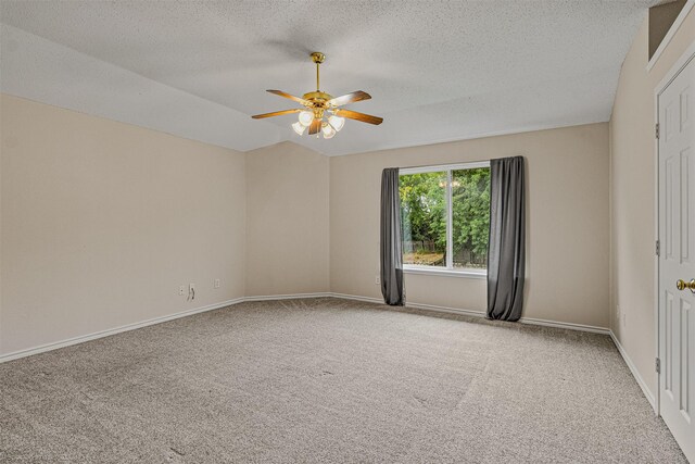 796 Oak Hollow Ln, Rockwall, TX 75087 - spare room with carpet floors, a ceiling fan, and a textured ceiling
