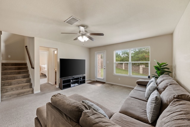 6524 Sheridan Cir, Arlington, TX 76017 - carpeted living room with stairs and a ceiling fan