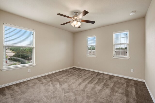 6524 Sheridan Cir, Arlington, TX 76017 - carpeted spare room featuring a smoke detector and a ceiling fan