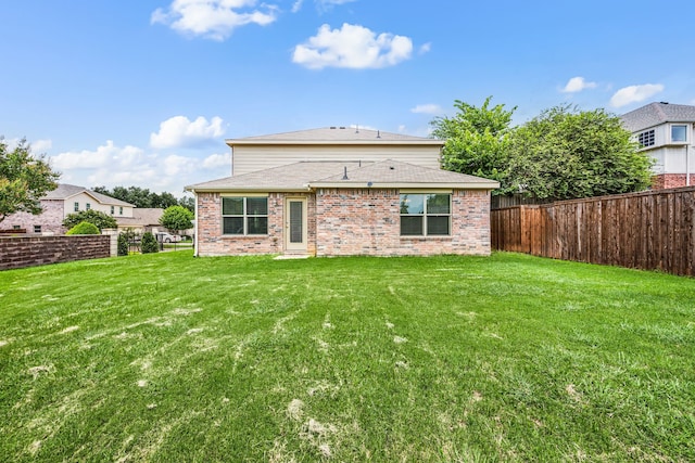6524 Sheridan Cir, Arlington, TX 76017 - back of house featuring a fenced backyard and brick siding
