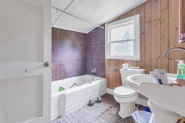1357 W State Highway 154, Quitman, TX 75783 - bathroom with lofted ceiling, bathtub / shower combination, and wooden walls