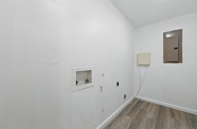 3105 Dupree St, Irving, TX 75062 - washroom with electric panel, electric dryer hookup, wood finished floors, and washer hookup
