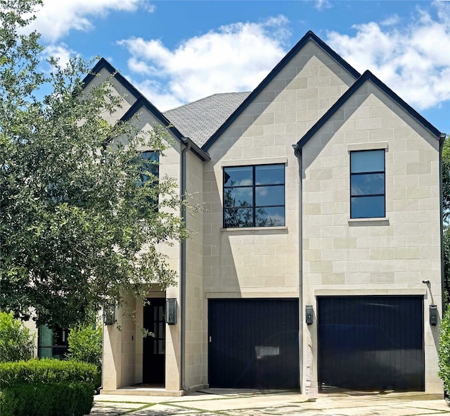 4635 W Amherst Ave, Dallas, TX 75209 - view of front of property featuring a garage and concrete driveway