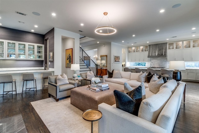 4635 W Amherst Ave, Dallas, TX 75209 - living room featuring recessed lighting, dark wood-style floors, and stairs