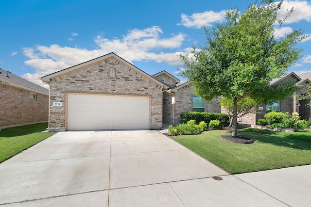 1112 Metaline Trl, Fort Worth, TX 76177 - view of front facade with driveway, brick siding, a front yard, and a garage