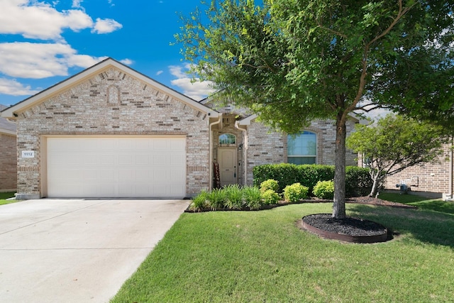 1112 Metaline Trl, Fort Worth, TX 76177 - view of front of house featuring concrete driveway, a front lawn, a garage, and brick siding