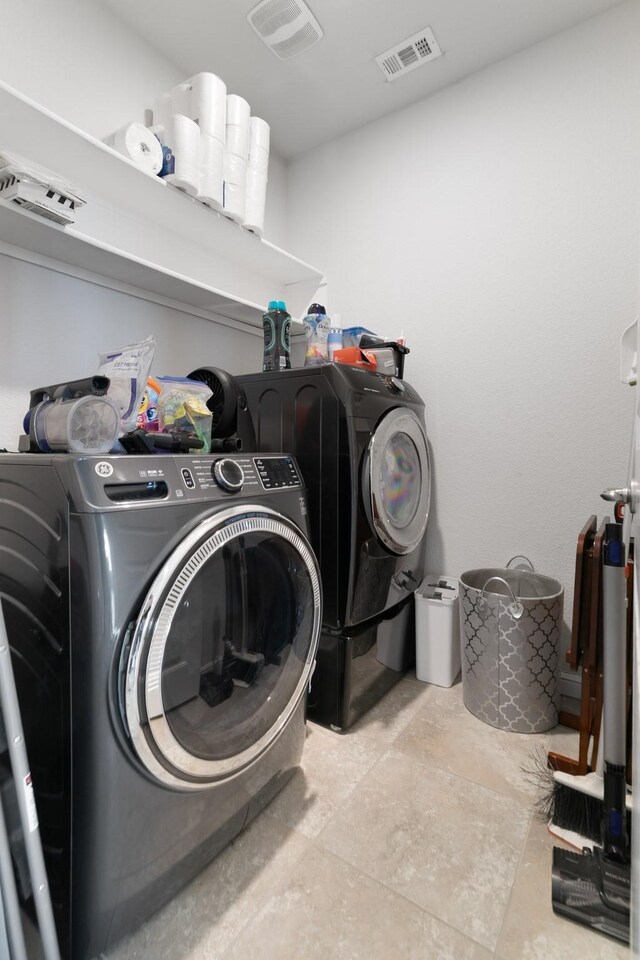 1112 Metaline Trl, Fort Worth, TX 76177 - laundry room featuring separate washer and dryer
