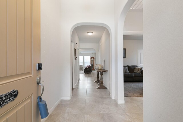 1112 Metaline Trl, Fort Worth, TX 76177 - foyer featuring arched walkways and light tile patterned flooring