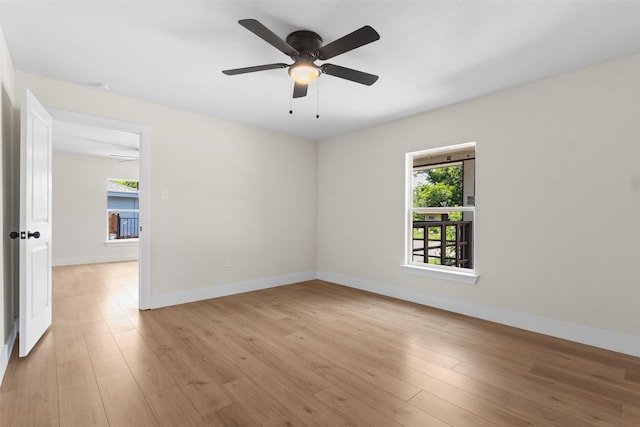 2117 Andrew Ave, Fort Worth, TX 76105 - spare room with plenty of natural light, light wood-type flooring, and ceiling fan