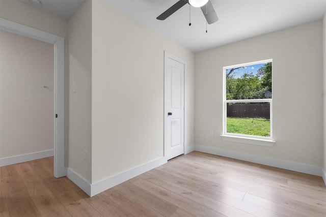 2117 Andrew Ave, Fort Worth, TX 76105 - unfurnished bedroom with light wood-style floors and a ceiling fan