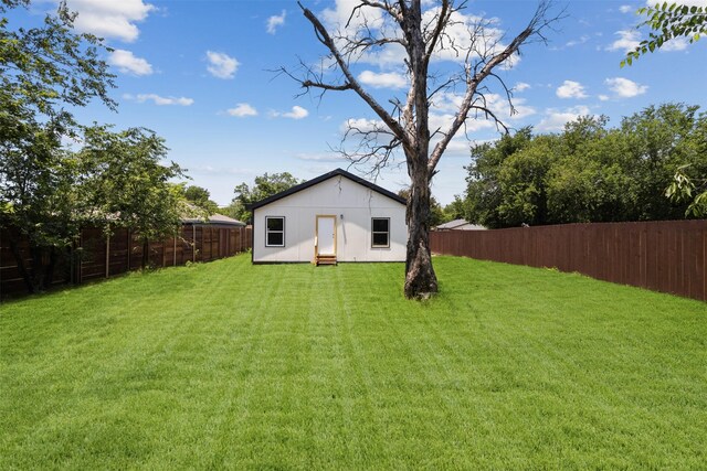 2117 Andrew Ave, Fort Worth, TX 76105 - back of property featuring a fenced backyard