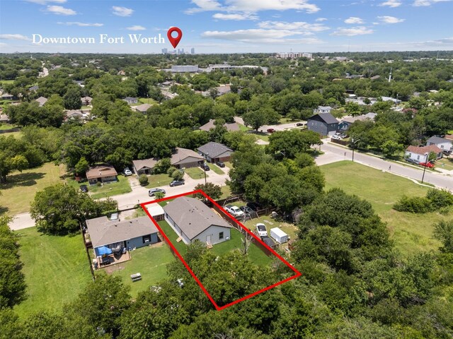 2117 Andrew Ave, Fort Worth, TX 76105 - aerial perspective of suburban area featuring property boundaries highlighted and a tree filled landscape