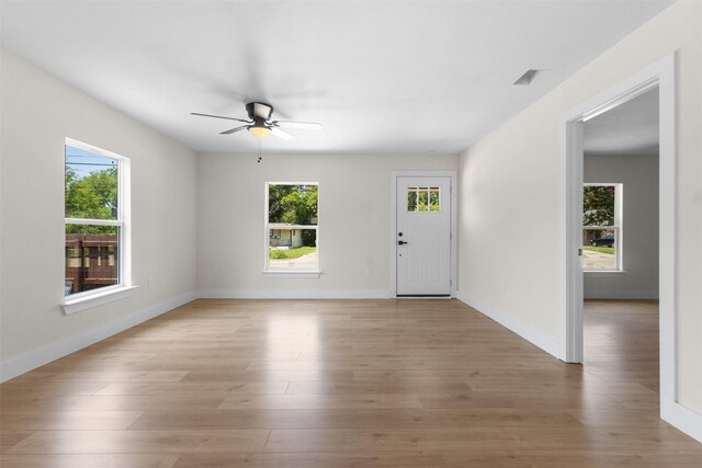 2117 Andrew Ave, Fort Worth, TX 76105 - foyer featuring a ceiling fan and light wood-style flooring