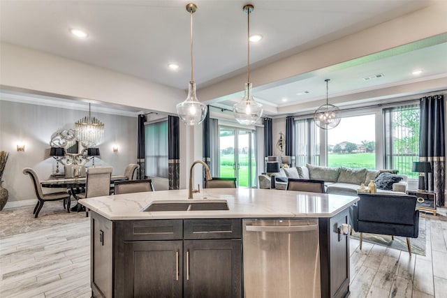 8509 Cocobolo Dr, Denton, TX 76207 - kitchen featuring stainless steel dishwasher, open floor plan, a chandelier, ornamental molding, and dark brown cabinetry