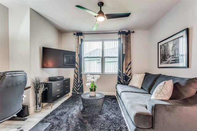 8509 Cocobolo Dr, Denton, TX 76207 - living area featuring ceiling fan and light wood-style flooring