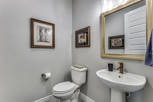 8509 Cocobolo Dr, Denton, TX 76207 - bathroom with toilet and baseboards