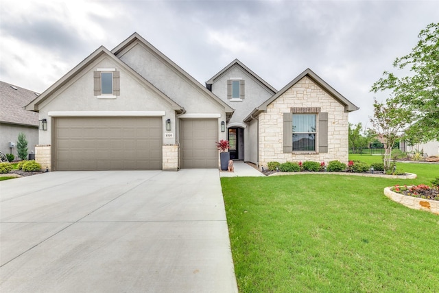 8509 Cocobolo Dr, Denton, TX 76207 - view of front facade with stone siding, a front lawn, concrete driveway, a garage, and stucco siding