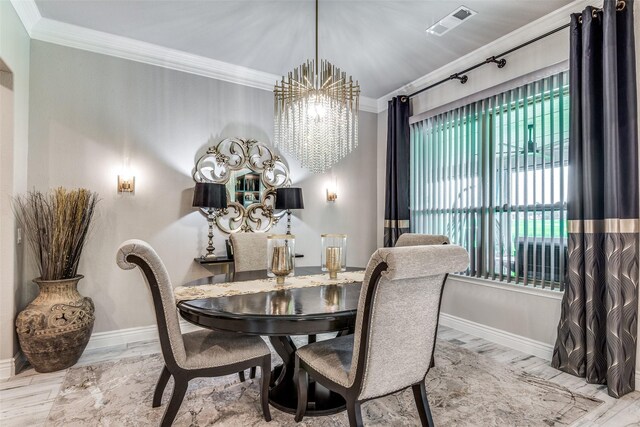 8509 Cocobolo Dr, Denton, TX 76207 - dining room featuring a chandelier, ornamental molding, and wood finished floors