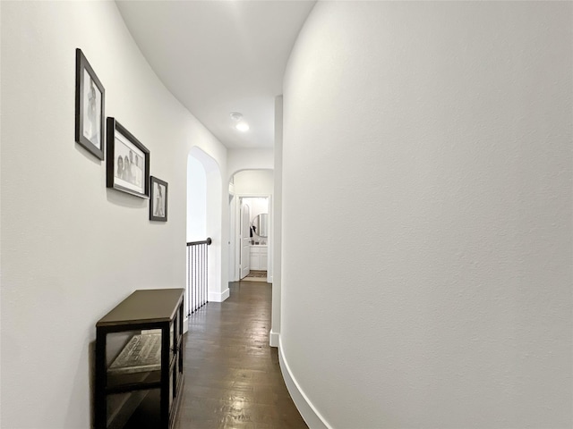 1500 Whistle Brook Dr, Allen, TX 75013 - hall featuring arched walkways and dark wood-style flooring