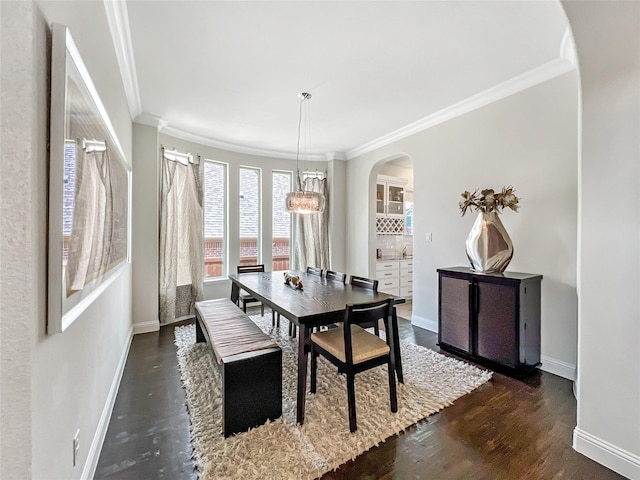 1500 Whistle Brook Dr, Allen, TX 75013 - dining area featuring arched walkways, ornamental molding, and dark wood-style flooring