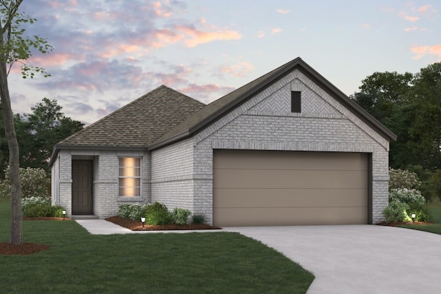 743 Hidden Feather Dr, Lavon, TX 75166 - view of front of house featuring driveway, an attached garage, brick siding, a yard, and roof with shingles